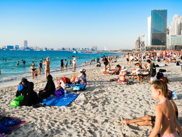 Sunbathers on the beach in Dubai.