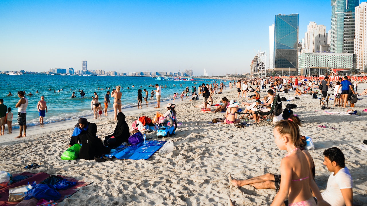 Sunbathers on the beach in Dubai.